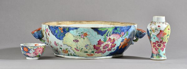 Three pieces of Chinese export tobacco leaf pattern famille-rose porcelain, Qianlong, comprising; a tureen base with lotus flower handles, 36cm. acros