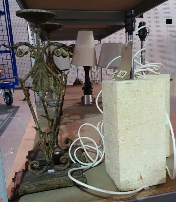 A pair of 20th century reconstituted white stone table lamps of rectangular form and a pair of candle torcheres, (4).