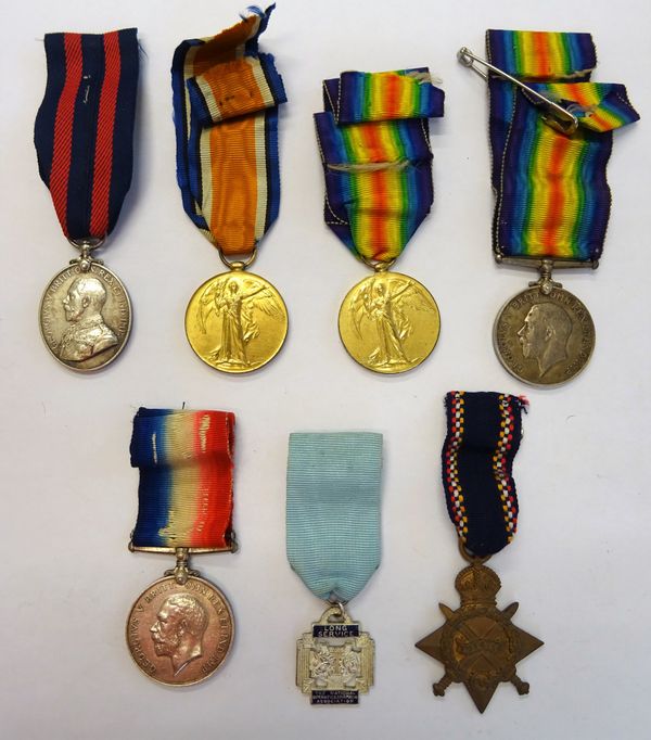 A 1914-15 Star to 2114 PTE G.J.STILE. DEVON;R, a 1914-18 British War Medal and a 1914-19 Victory Medal to 321076 SJT J.H.EPLETT. R.A., a Territorial F