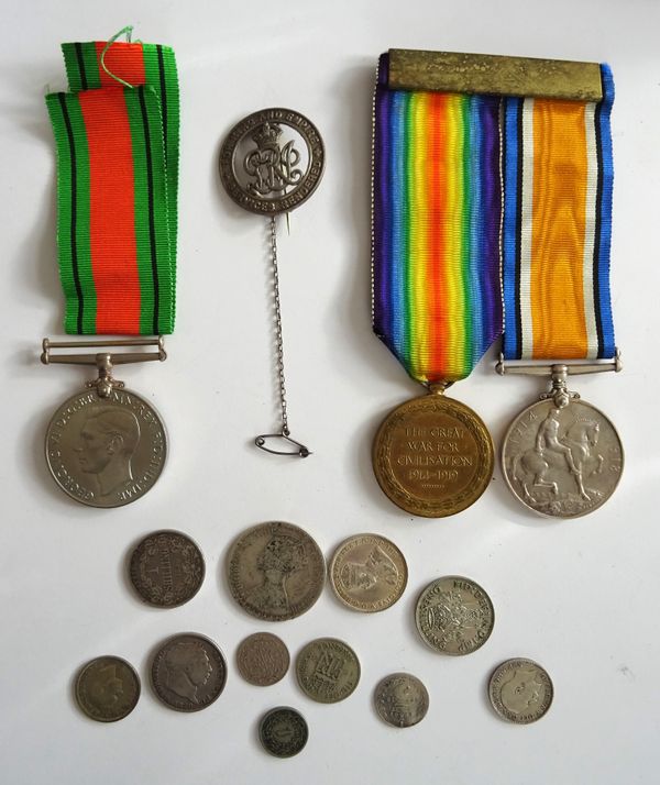 The 1914 - 18 British war medal and the 1914 - 19 Victory medal to M-282911 PTE. E. ROLFE. A.S.C. mounted on a bar, a First World War period discharge