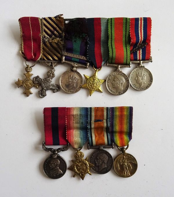 A group of First World War dress miniature medals, comprising; The Distinguished Conduct Medal, The 1914 Star, The British War Medal and The Victory M