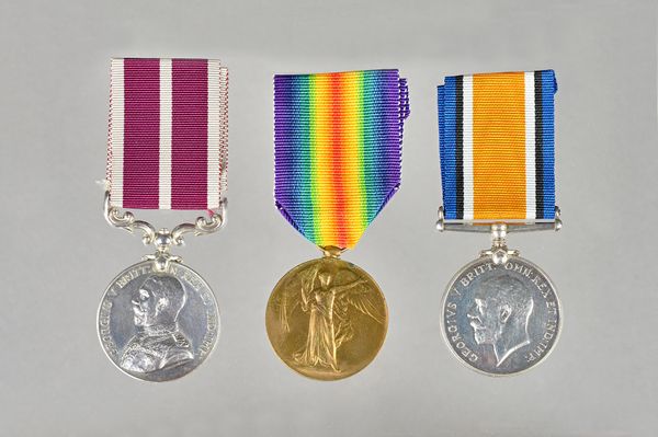 A 1914-18 British War Medal and a 1914-19 Victory Medal to 67060 GNR.J.G.SIMMONDS. R.A. and a Meritorious Service Medal, George V Field Marshall's Bus