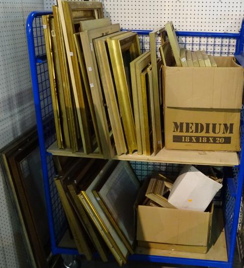 A large quantity of mainly 20th century and later picture frames of various sizes, including gilt gesso, gilt and ebonised, silvered and others, the l