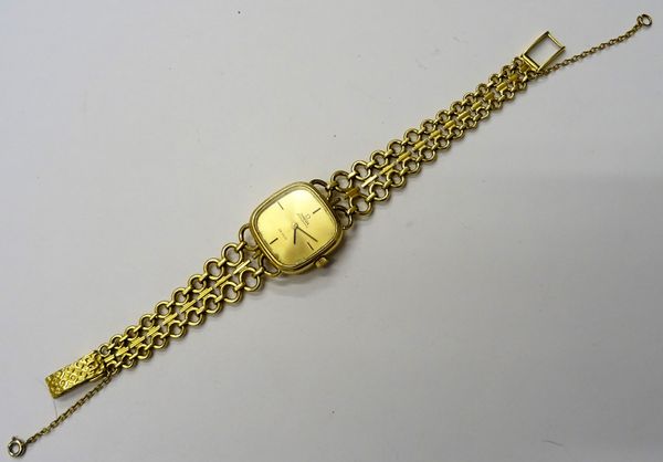 An Omega Automatic De Ville 18ct gold lady's bracelet wristwatch, the curved square gilt dial with black hands, the two row graduated circular and bar