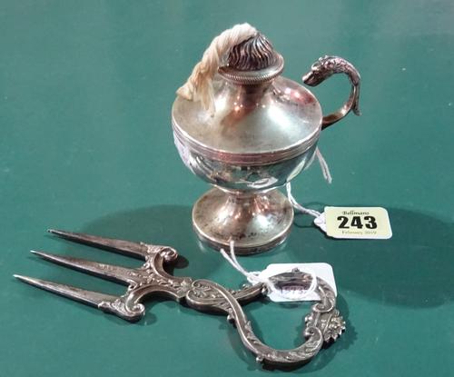 A table lighter, of urn shaped form, the handle with a mythological animal head finial, raised on a circular base, height 10cm, North European, probab