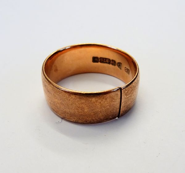 A 9ct gold wide band wedding ring (cut), Chester probably 1907, ring size U 1/2, weight 8 gms.