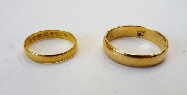 A Victorian 22ct gold plain wedding ring, Birmingham 1887, ring size N, weight 1.8 gms and another gold wedding ring, apparently unmarked, ring size T