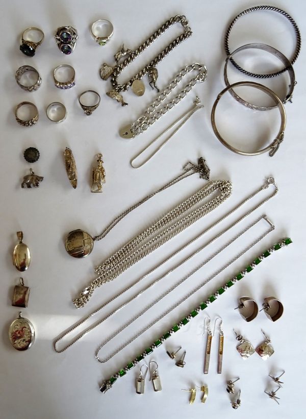 Mostly silver jewellery, comprising; eight rings, eight pairs of earrings, three bangles, a charm bracelet, two further bracelets, four pendants and c