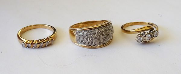 A 9ct gold and diamond ring, in a curved panel shaped design, a 9ct gold and diamond set six stone half hoop ring, mounted with a row of circular cut