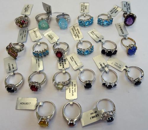 Twenty-one silver and gem set rings, in a variety of designs, mostly detailed 925 (21).