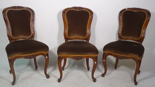A set of three 19th century French carved oak side chairs of Louis XV design, 50cm wide x 88cm high (3).