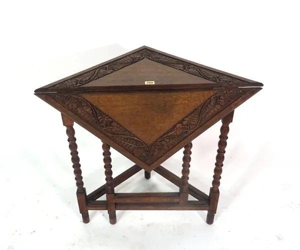 An 18th century style oak drop flap handkerchief table,on bobbin turned supports, 75cm wide x 72cm high and a George II style mahogany wine table, 29c