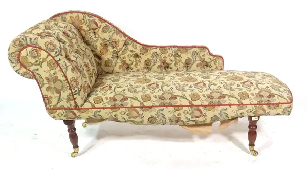 A 20th century mahogany framed chaise longue, with floral button back upholstery, 150cm long x 80cm high.