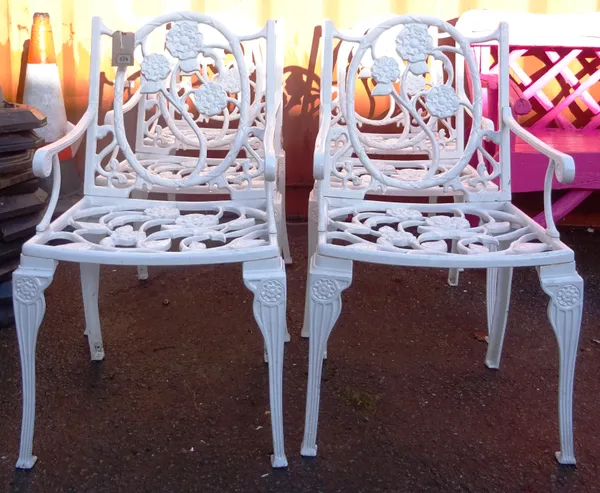A set of six 20th century white painted metal garden open armchairs, (6).