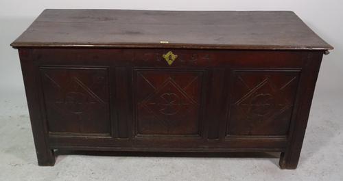 A 17th century and later oak coffer, 130cm wide x 63cm high.