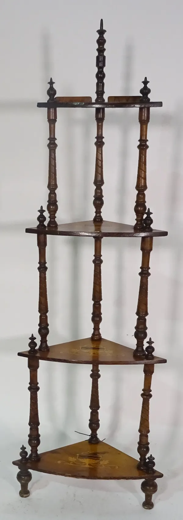 A Victorian walnut and inlaid four tier corner whatnot 50cm wide x 151cm high and an Edwardian mahogany jardiniere stand, 34cm wide x 102cm high, (2).