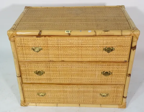 A 20th century bamboo and rattan chest of three long drawers, 84cm wide x 66cm high.