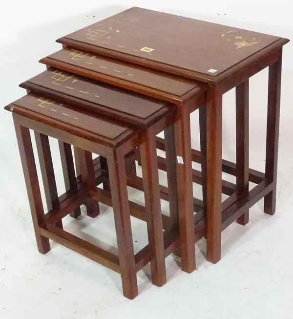 A 20th century nest of four mahogany and brass inlaid tables, the larger 53cm wide x 55cm high.