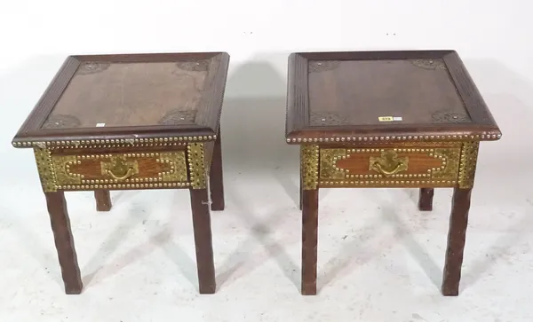 A pair of African hardwood brass studded single drawer low side tables, 53cm wide x 48cm high, (2).