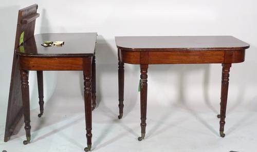 A Regency style mahogany 'D' end dining table on reeded tapering supports, 104cm wide x 72cm high, 165cm fully extended, to include one extra leaf.