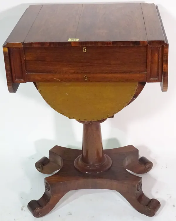 A George III rosewood drop flap work/ games table, reversible top above drawer and bag, on outswept supports, 50cm wide x 73cm high.