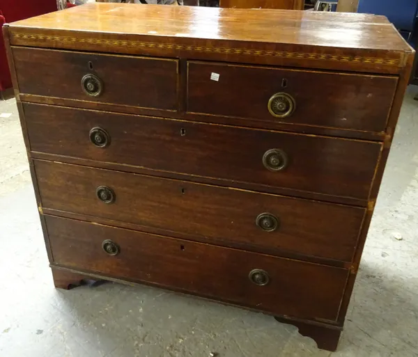 A George III inlaid mahogany chest of two short and three long graduated drawers on bracket feet, 99cm wide x 92cm high.