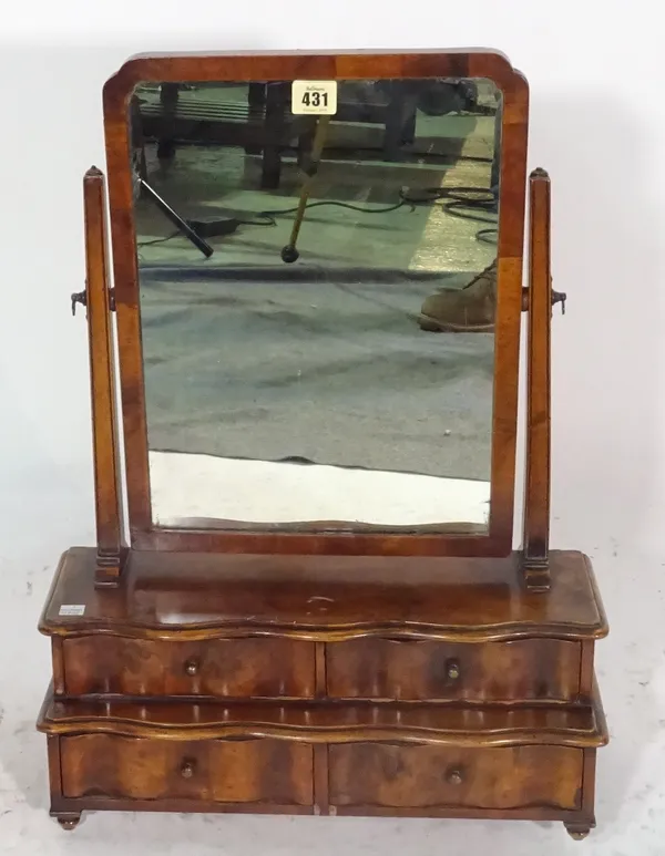 A Queen Anne style walnut dressing table mirror with four drawers on bun feet, 42cm wide x 57cm  high.