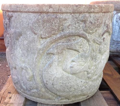 A pair of early 20th century reconstituted stone planters with hunting scenes, 40cm wide x 32cm high. (2).