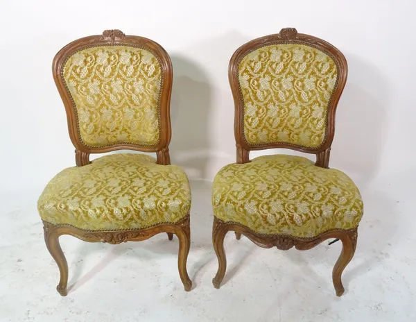A pair of Louis XVI style beech side chairs on fluted tapering supports (2).