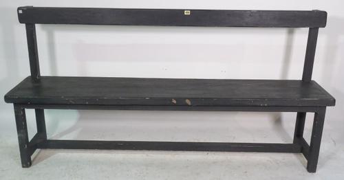 An early 20th century black painted hall bench on block supports, 153cm wide x 92cm high.