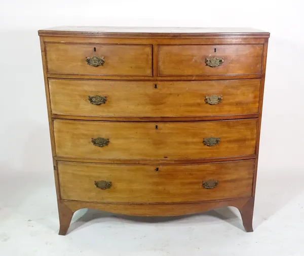 A Regency mahogany bowfront chest of two short and three long graduated drawers, on splayed bracket feet, 103cm wide x 103cm high.