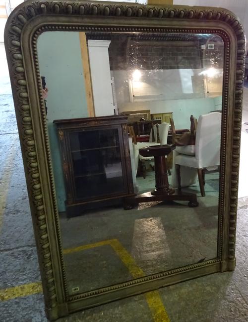 A 19th century and later grey painted arch top overmantel mirror with egg and dart moulded frieze, 106cm wide x 139cm high.