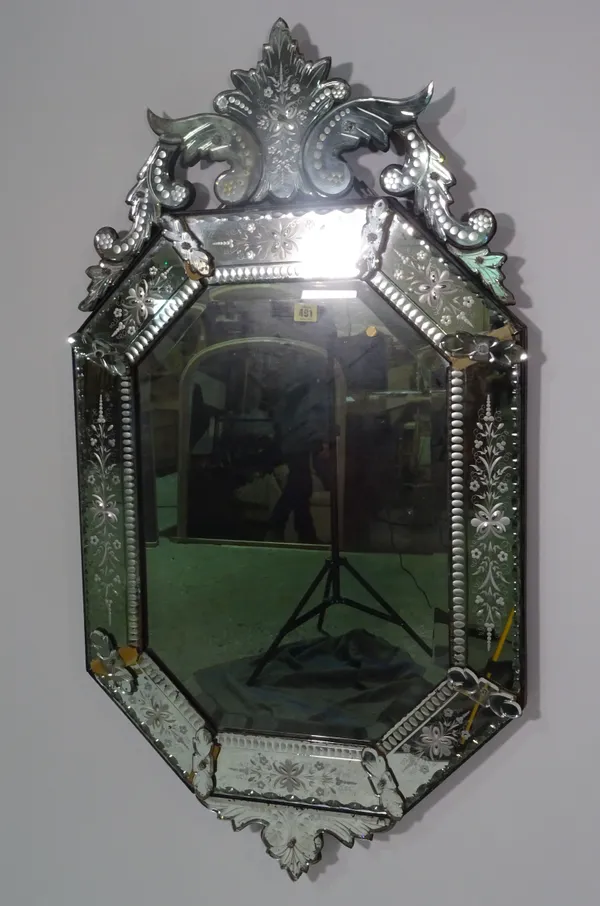 An early 20th century cut and etched glass Venetian wall mirror of compressed octagonal form, 64cm wide x 116cm high, together with a similar strut mi