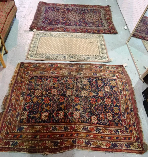 A Ghasghai rug with birds, an Afshar rug with allover flowers, and a machine made trellis rug, (3).