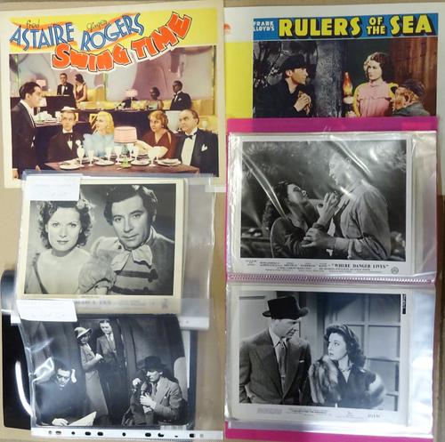 VINTAGE FILM PUBLICITY STILLS AND LOBBY CARDS, 1930s - 1950s:  approx. 100, the black and white publicity stills with printed caption labels, studio /