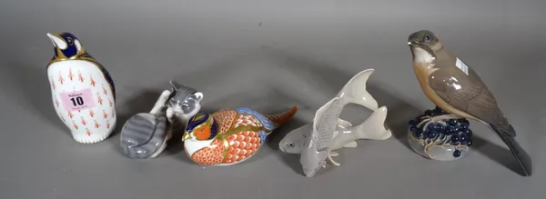 Ceramics, including; a Royal Crown Derby paperweight modelled as a penguin, a Copenhagen model of a cat, a blackbird and a blue and gold model of a fi