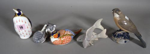 Ceramics, including; a Royal Crown Derby paperweight modelled as a penguin, a Copenhagen model of a cat, a blackbird and a blue and gold model of a fi