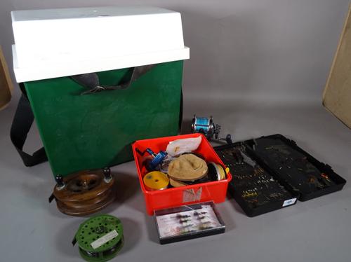 Fishing interest, including; a mixture of vintage tackle, large Hardy fly box lures rigs, reels for fly fishing a Mitchell riptide boat reel, small sp