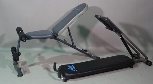 Macry Sbz40, a gym equipment work bench 121cm long x 50cm high and a Norditrack leg shaper, 134cm long, (2).   L9