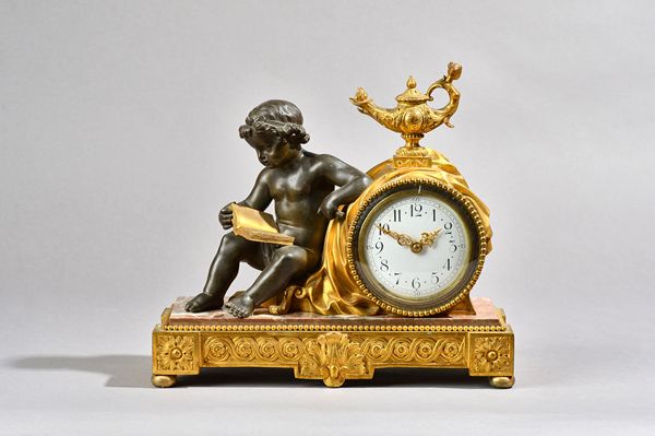 A French bronze, gilt metal and marble mounted figural mantel clock, late 19th century with putto resting against a drum case and white enamel dial ov