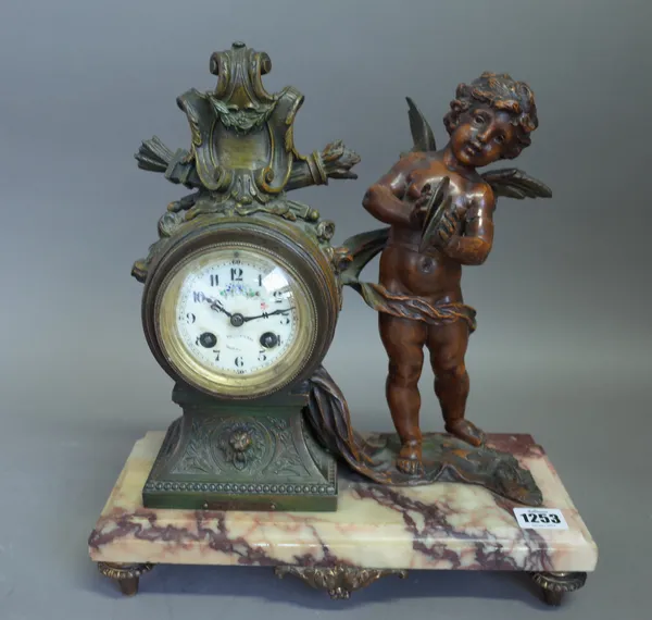A French spelter and marble figural mantel clock, late 19th century, titled 'Enfant aux Cymbales', with foliate enamel dial and two train movement wit