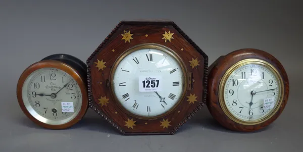 A French late 19th century rosewood and brass inlaid clock of octagonal form 17cm wide, an American 3.5inch dial clock by The Gamewell Co, Newton Mass