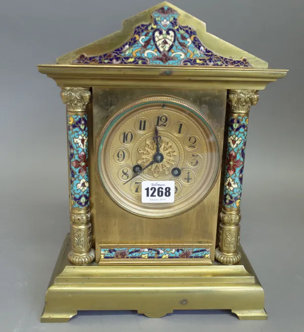 A French gilt brass and cloisonne mounted 8 day mantel clock, late 19th century, the dial flanked by pillar supports over a plinth base, 30cm high, pe