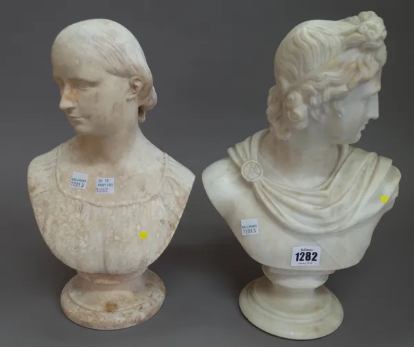 A white marble bust of Apollo, after the Antique, early 20th century, on a turned socle, 33cm high and one further composite bust of a woman, (2).