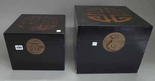 A group of modern Chinese wares, including; an archaic stone figure in a perspex case, two black lacquered square boxes, two wicker baskets, three cir