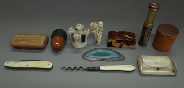 A quantity of small collectables, including; a fruitwood carved 'acorn' serving spool, 6cm, an early 20th century ivory 'crown' pin cushion, 5cm high,