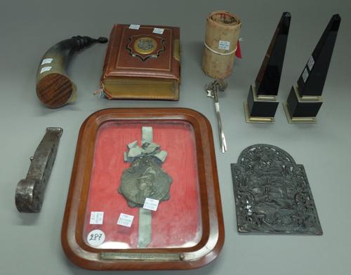 A group of collectables comprising; a miniature cylinder music box hidden within a leather and brass bound book, an Italian bronze medallion dated 188