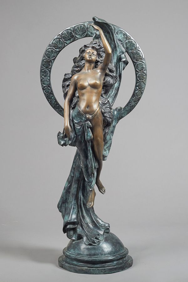 Untitled, patinated bronze, female nude under a foliate cast halo on a domed base, unsigned. 127cm high.