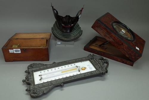 A group of collectables, comprising; a cylinder music box by F.Rzebitschek Prag, 21.5cm wide, a French metal and enamel wall thermometer, 39cm high, a