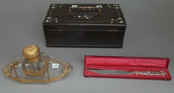 An Alphonse Giroux paper knife in a leather, velvet lined case, 21.5cm, a foliate inlaid rosewood writing box, 25cm wide and a gilt metal and glass en